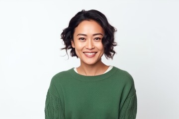 Portrait of a smiling woman looking at camera isolated on a white background