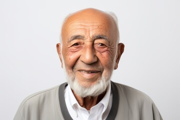 Obraz premium Portrait of a senior asian man smiling on white background.