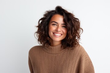 Portrait of a beautiful young woman with curly hair on a white background