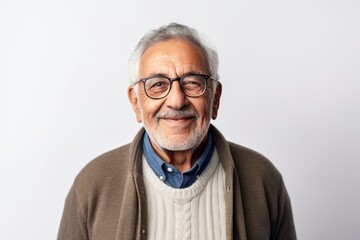 Obraz premium Portrait of a senior asian man wearing glasses on white background
