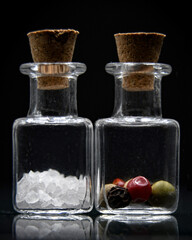 Salt and Pepper in small bottles
