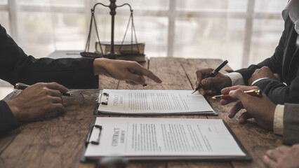 Full concentration at work. correctly sign contracts with clients, Sign and Execute Binding Contracts, contracts jargon, legal terms and definitions, signed by unauthorised person