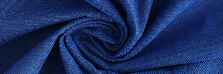 Fototapeta na wymiar Shaped blue fabric background or design element.