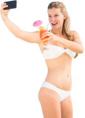 Digital png photo of happy caucasian woman with drink taking selfie on transparent background