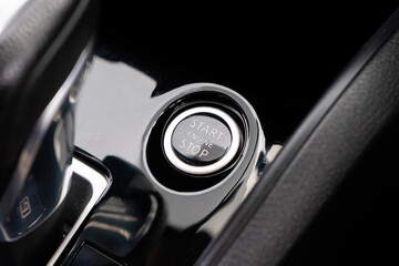 Close up engine car start button. Start stop engine modern new car button,Makes it easy to turn...