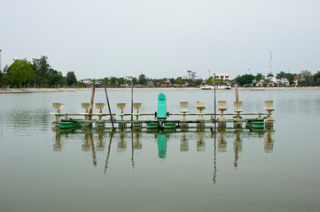 Obraz premium Electric wastewater treatment equipment increases oxygen in water, Sakon Nakhon, Thailand