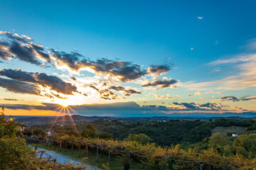 Colorful sunset in the vineyards at the border between Italy and Slovenia