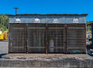 An oxygen and acetylene storage shack at a rail yard