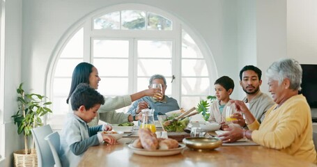 Food, big family and eating together in home, generations in dining room bonding and celebrate at table. Grandparents, parents and children sharing lunch, dinner and drinks in apartment in Mexico. - Powered by Adobe