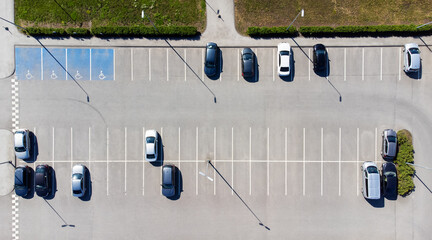 Aerial view on free city parking lots with cars