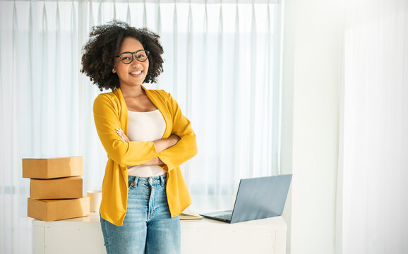 Portrait Beautiful  SME Business Black Woman Smiling Positive, Business Lifestyle, Confident Owner Casual Girl, Startup Small Sme Online Business Job. Success Freelance Woman Work At Home Office Desk