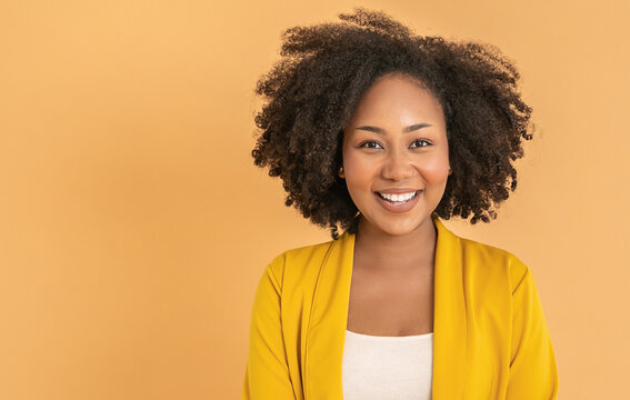 Portrait smile confident business designer black woman yellow suit office. Black business girl Startup successful power business leader women executive people looking copy space isolated on yellow