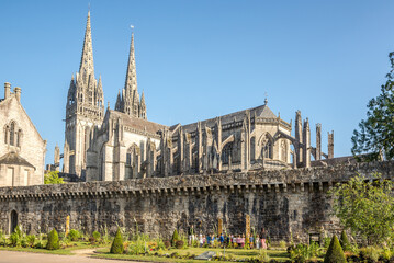 View at the Cathedral of Saint Corentin in the streets of Quimper in France - obrazy, fototapety, plakaty