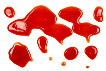 Red ketchup splashes isolated on white background, tomato pure texture, top view