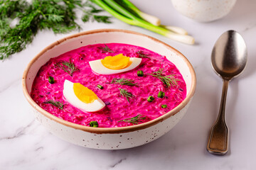 Cold summer soup of beets, yogurt, cucumbers, eggs and dill.