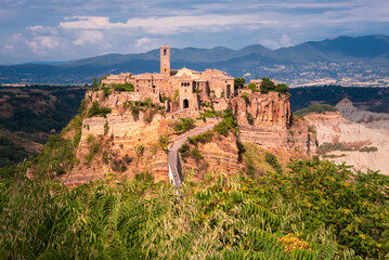 Ancient town of Bagnoregio, Italy. Old village on hill with a bridge