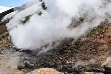 Volcanoes. Fumarole field. snow volcanoes in Kamchatka, snow mountains as geysers