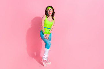 Fototapeta na wymiar Photo of sporty lady in retro nostalgia sport outfit look empty space sale offer isolated over pastel color background