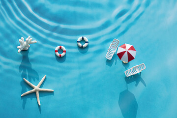 Summer scene with parasol, sunbed, and swim ring isolated © bong