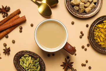 Fototapeta na wymiar Traditional Indian hot drink with milk and spices - Masala tea