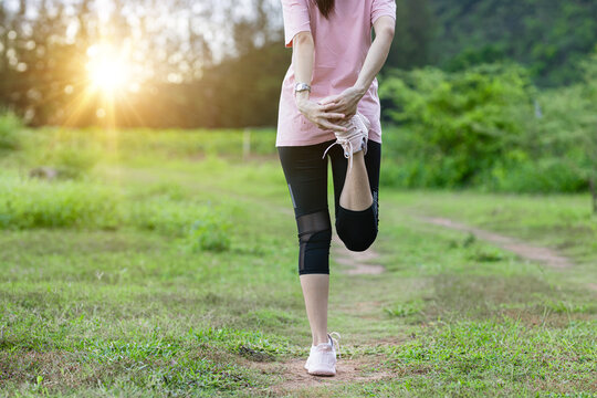 Sporty Asia female runner  image of attractive woman in modern sportswear, dynamic movement, side view, sports and healthy lifestyle.