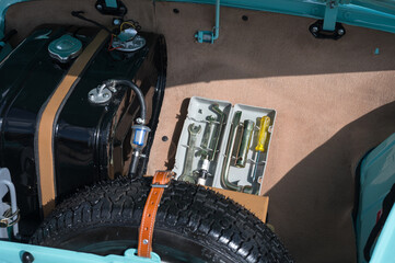 Detail of the trunk of an iconic classic Spanish Seat 600, in the trunk is the fuel tank, the spare...