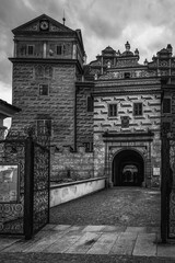 Black and white photo in front of the castle gate