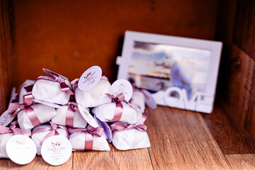 Happily married stacked on a shelf and a picture frame in the background