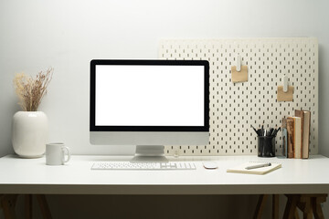Bank screen of desktop computer on desk at workplace of graphic designer, blogger