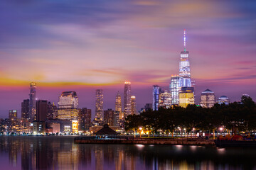 Fototapeta na wymiar New York City Manhattan downtown skyline at dusk with skyscrapers over Hudson River,