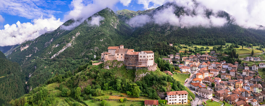 medieval castles of northern Italy.  Castle Stenico and village. Trentino region, province of Trento. Aerial drone high angle view