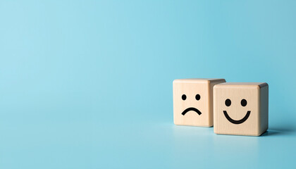 wooden cube block unhappy face to happy for creative, solution, problem solving concept