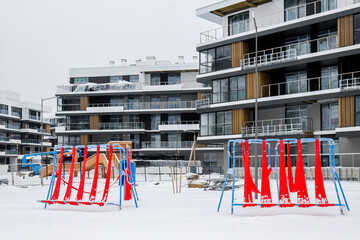 playground in a suburban residential complex in winter