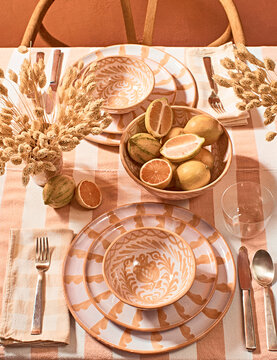 food, table, decoration, plate, glass, dinner, holiday, setting, restaurant, Spanish, table cloth, orange, neutral, brown, design, pattern,