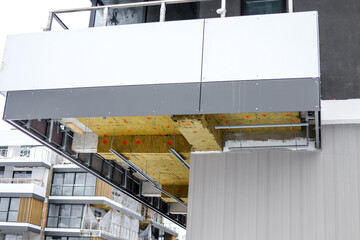 Bottom shot of thermal insulation material on the terrace of unfinished edifice. mineral wool insulation, warm house, eco-friendly insulation
