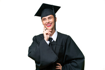 Young university graduate  caucasian woman over isolated background thinking an idea while looking...