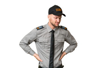 Young security caucasian man over isolated background suffering from backache for having made an effort
