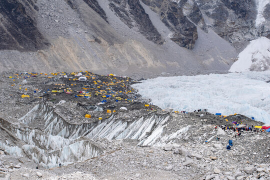 Camps at Everest base camp. World's highest glacier Khumbu glacier and other hanging glaciers on world's highest mountains. Ice, rocks, debris and glaciers seen around everest base camp in nepal. 