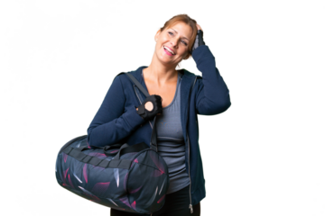 Middle-aged sport woman with sport bag over isolated background has realized something and intending the solution