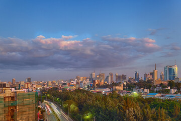 Nairobi City skyline in the evening on a cloudy night