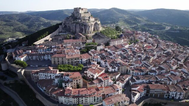 Drone aerial view over the walled Village of Morella and its Castle on top of the hill in Castellon Province, Spain