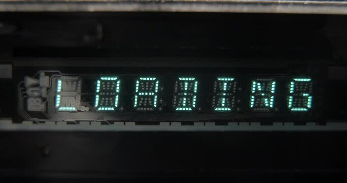 LCD display close-up, playing a disc from a DVD player