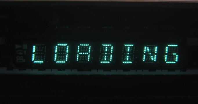 LCD display close-up, playing a disc from a DVD player