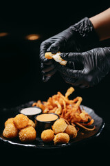 Tear the cheese ball in hands