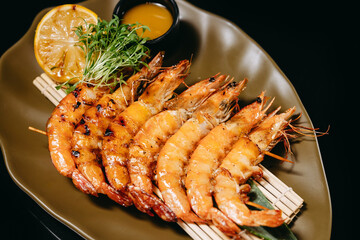 Fish dish langoustines from Hosper on the green plate