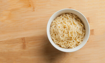 Ramen noodles in a bowl and chopsticks. Ramen concept. Noodle concept.