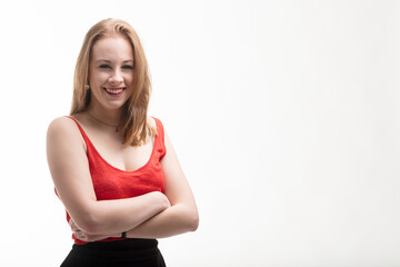 Fair-skinned woman in red dress laughs