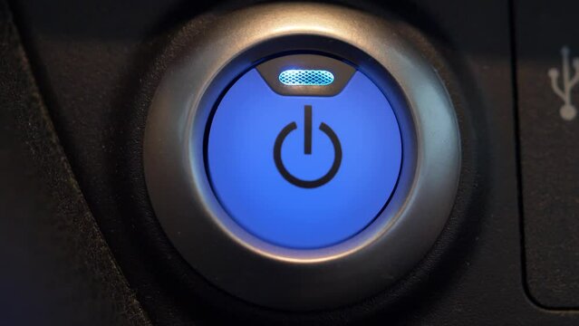 Pressing Stand By Power Button To Turn On and Off the Electric Car Close-Up