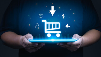 Hand of businessman showing shopping cart icon on tablet, Online shopping and e-commerce concept.