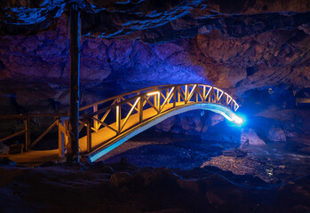 Bridge in Bolii cave ( Pestera Bolii ), near Petrosani city, Hunedoara county, Romania. The cave is...